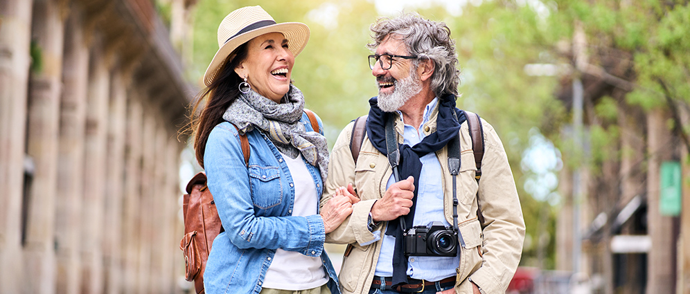 Older couple walking outside