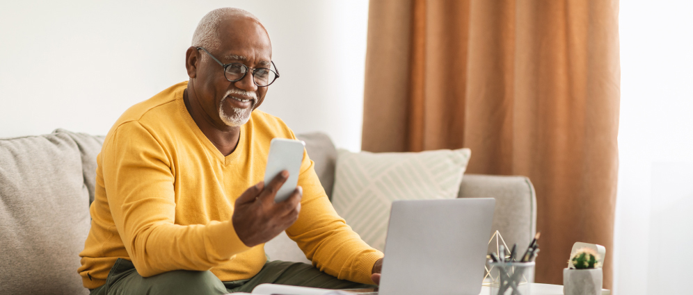 Man using mobile device.